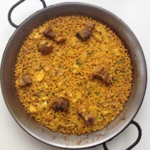 Paella de costilla y col